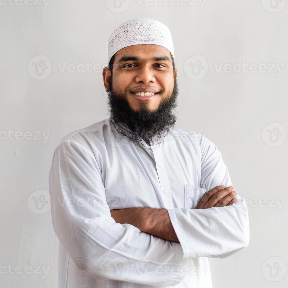 Muslim Man Smiling With Beard in Traditional Attire Indoors photo