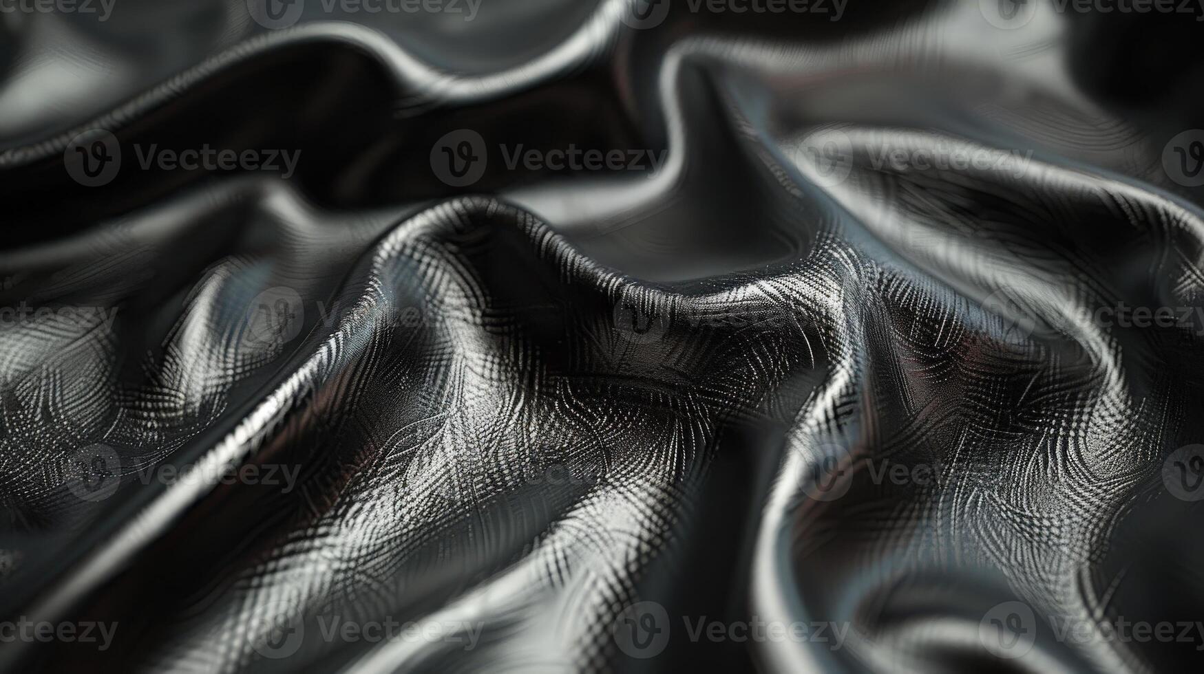 Black Leather Material Displaying Texture and Shine in Soft Lighting photo