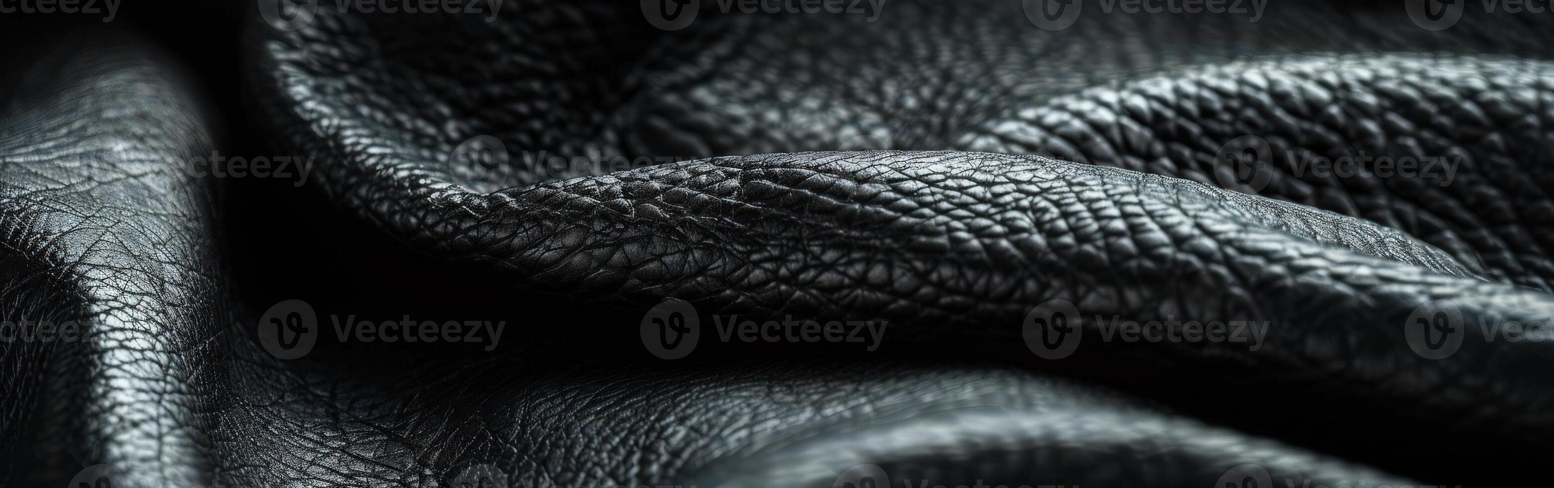 Close-Up of Black Leather Material Showcasing Texture and Quality photo