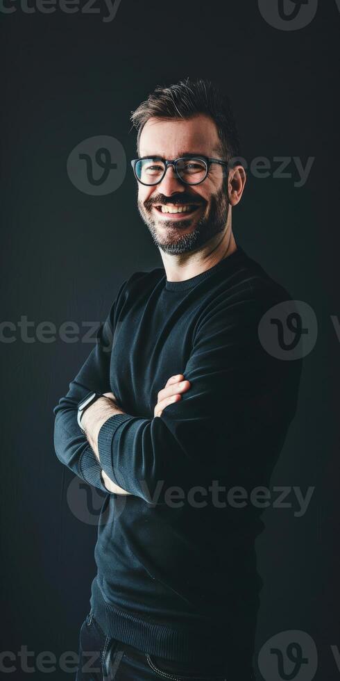 Smiling Male Executive in Minimalist Portrait Against Dark Background photo