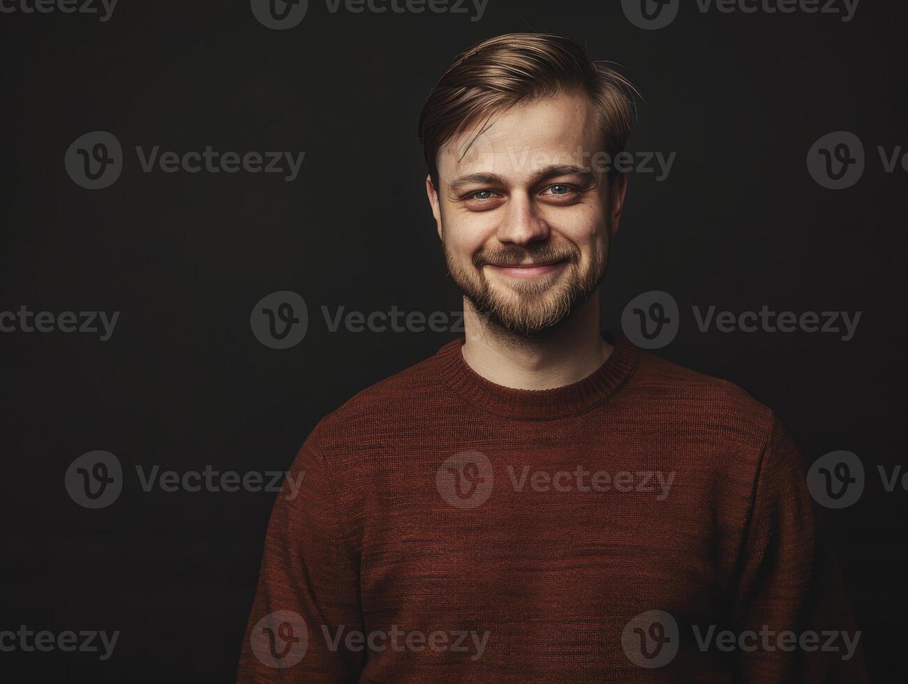Smiling Male Executive Posing Against Dark Background in Casual Attire photo