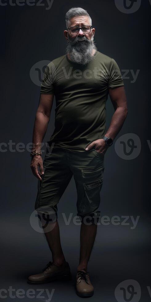 Man Posing in Olive Green Outfit With Beard in Dimly Lit Studio photo
