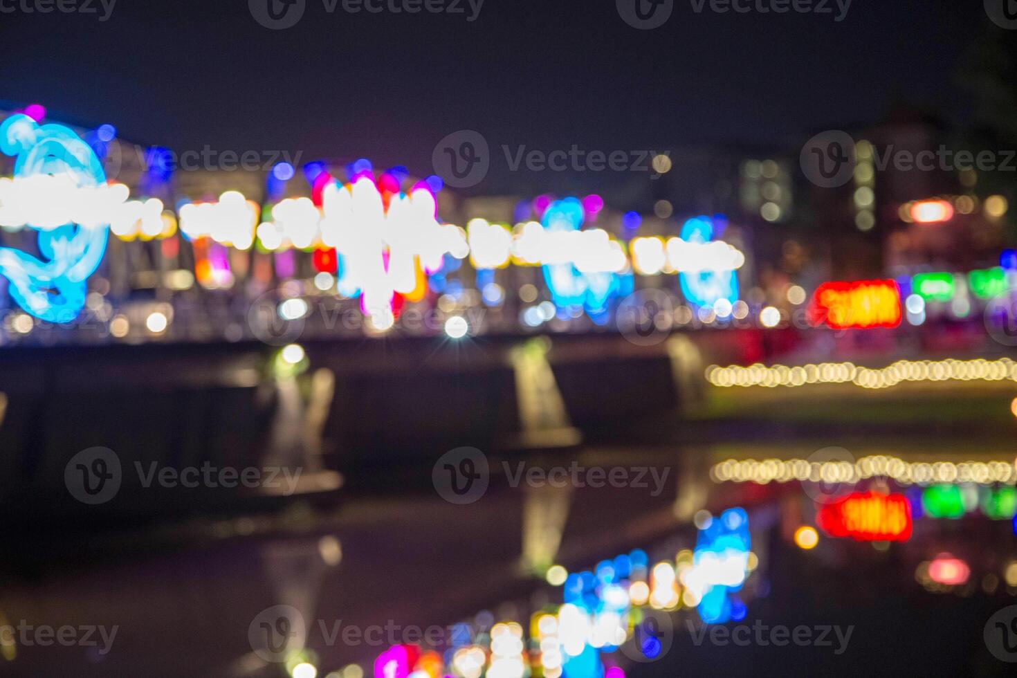 Blurry bokeh light reflex on the river. photo