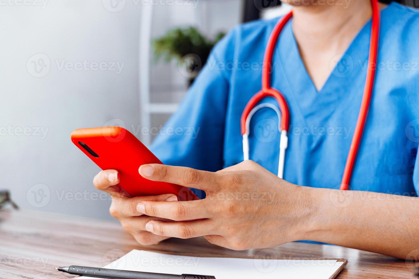 doctor using mobile phone, health staff using a phone. photo
