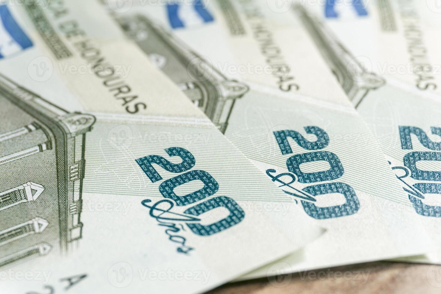 A macro photograph of a pair of 200 lempiras bills. photo
