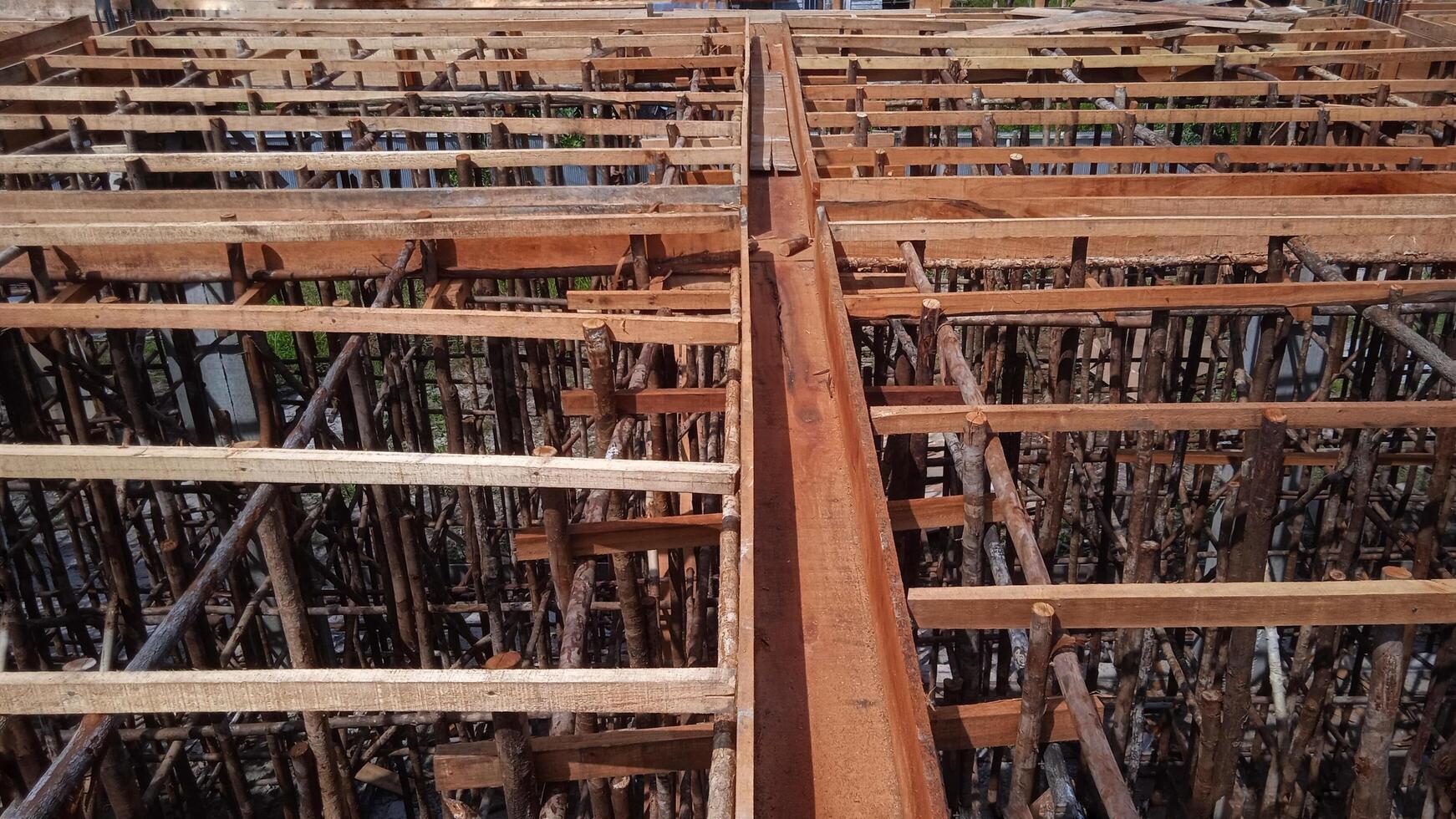 Wooden frame supporting the beam structure under construction. photo