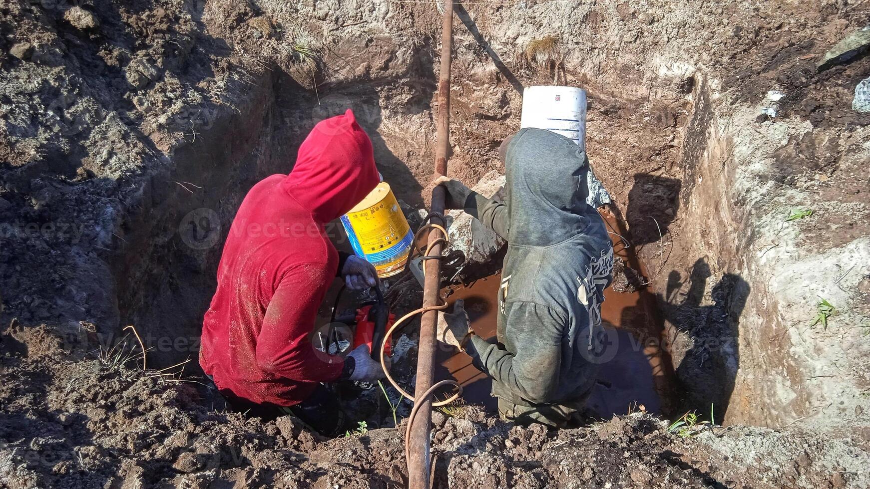 Construction work in the foundation pit photo