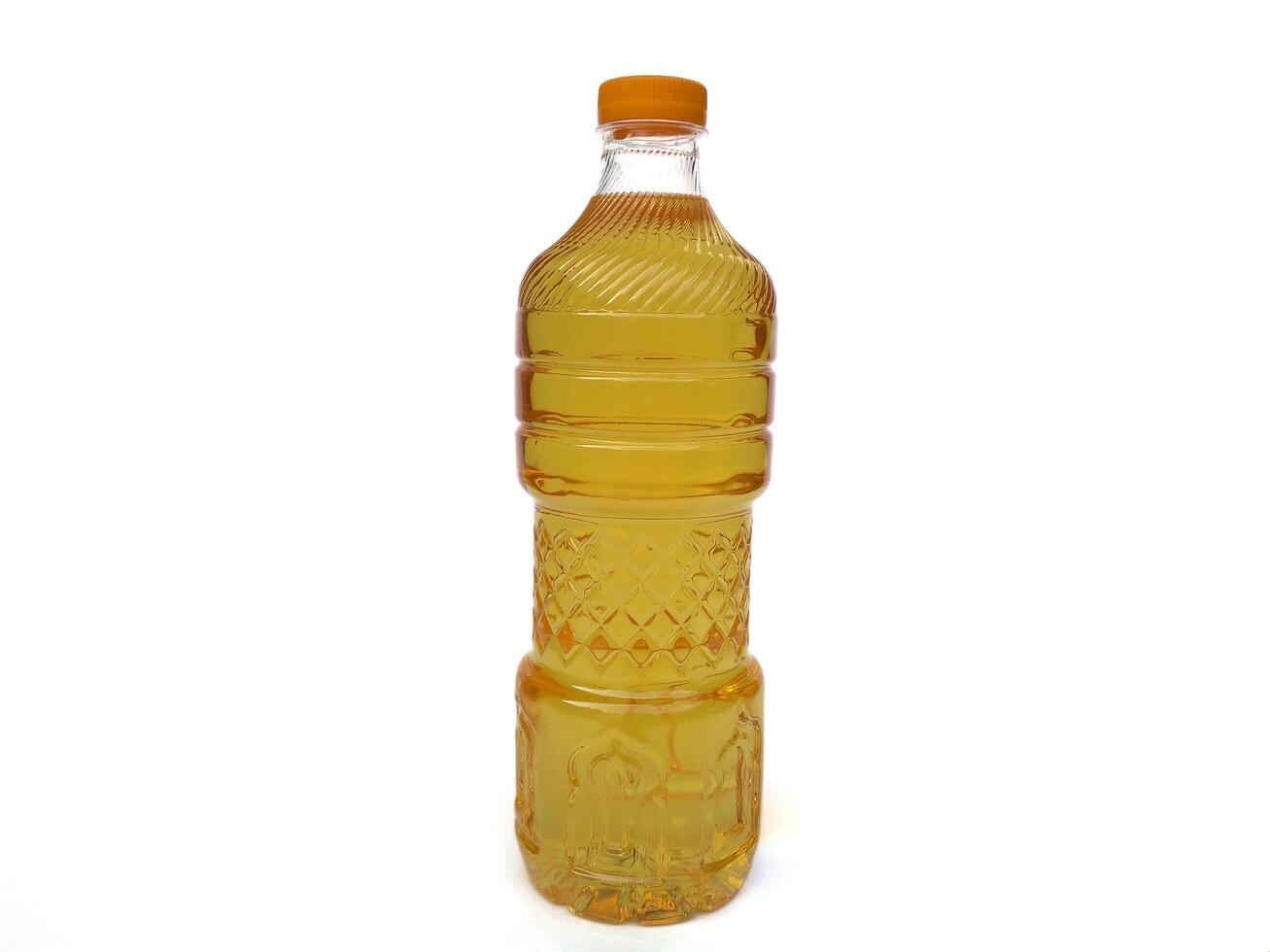 plastic oil bottle isolated on white background photo