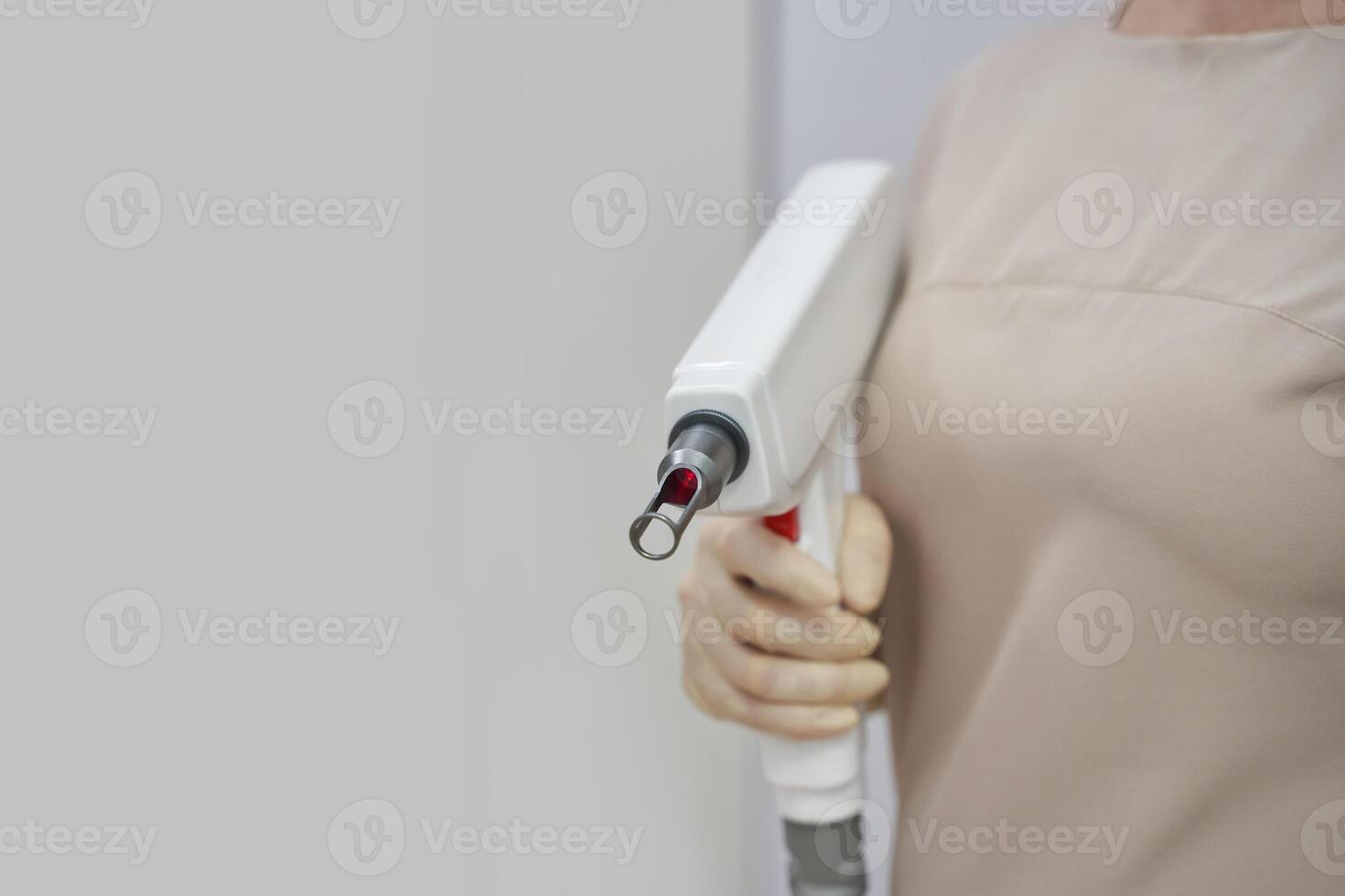 A beauty clinic with a white laser machine. A specialist offers hair removal and facial treatments using advanced diode technology for health and skincare photo