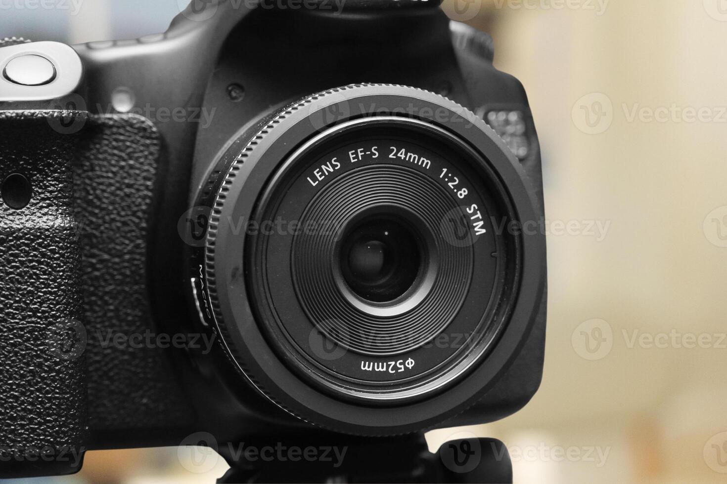 A close up view of DSLR Camera in cafe photo