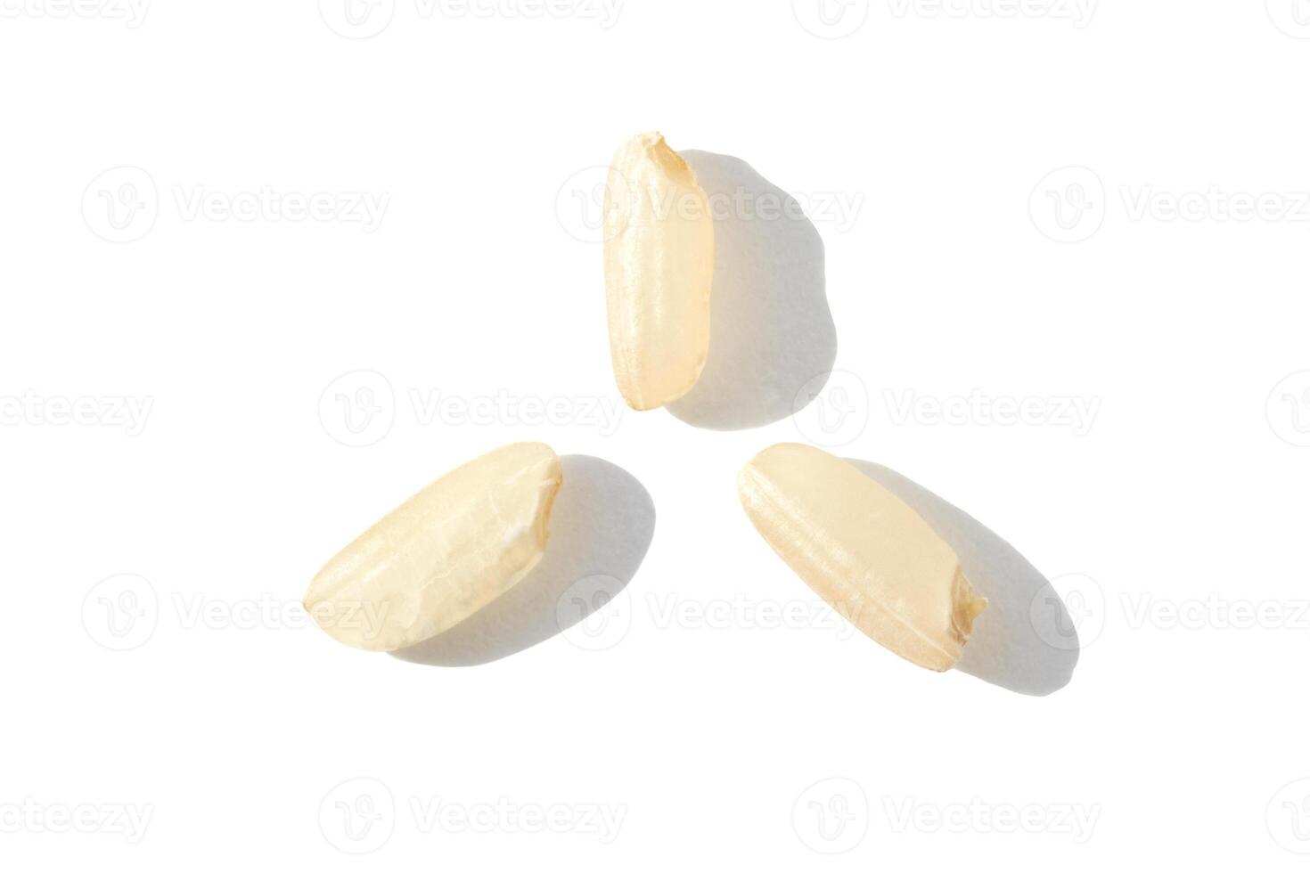 A top view captures the raw beauty of white basmati and brown rice grains. The macro closeup highlights their diverse textures, presenting a wholesome, nutritious food staple. photo