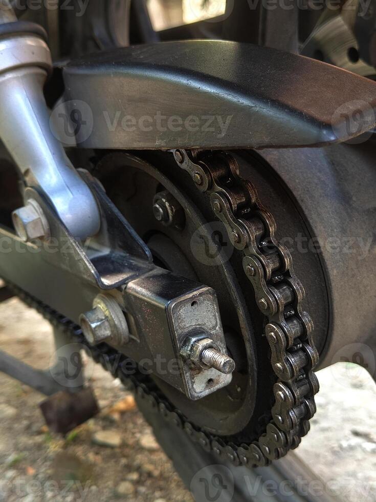 Detail of a motorcycle rear chain. Motorbike element. photo
