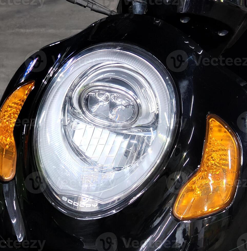Motorcycle lamp. as part of the motorcycle headlight Used for illuminating the night. photo