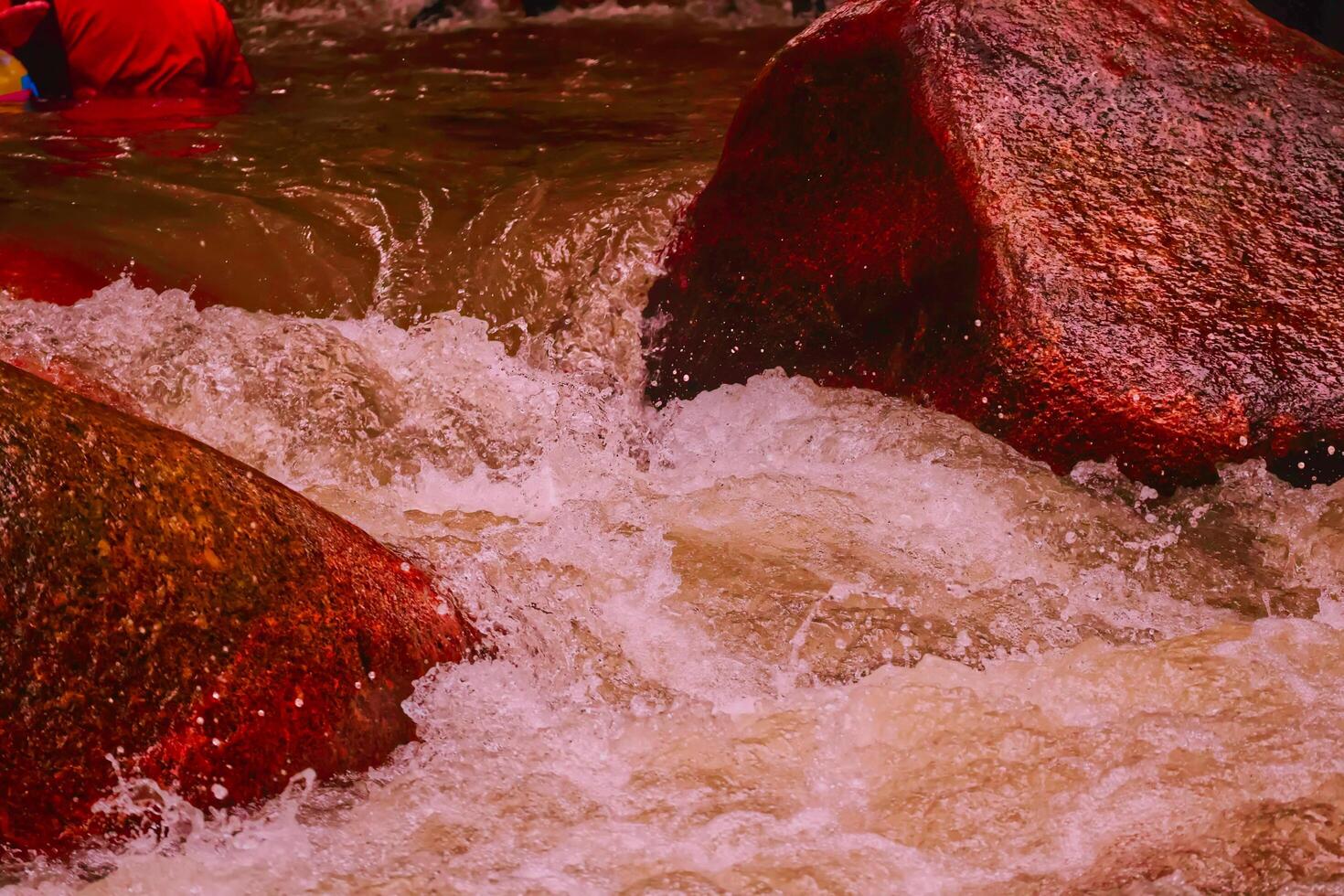 Wonderful streams captured in the camera's high-speed shutter mode resulted in a freeze-splash water image in Ulu Yam public resort Malaysia. photo