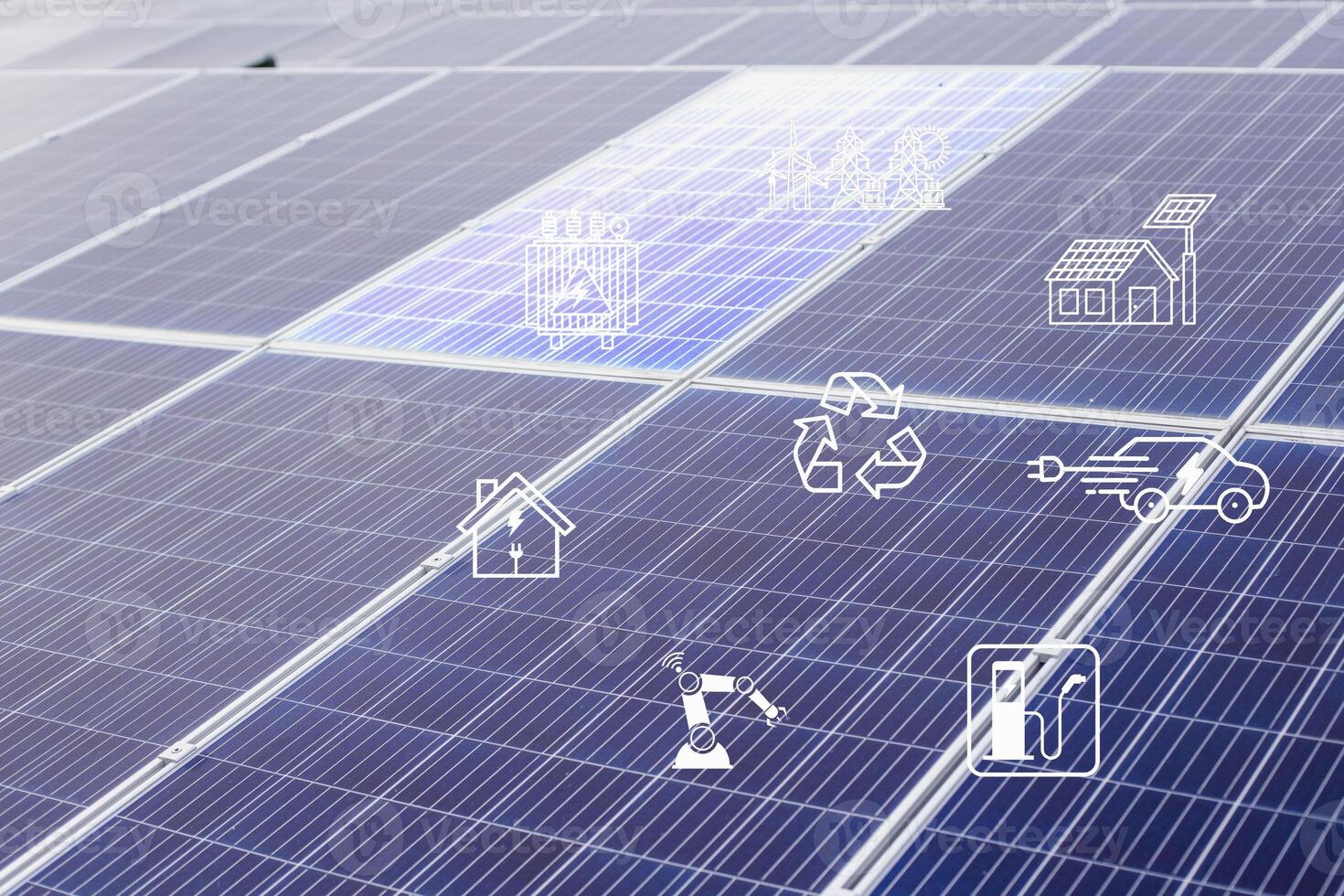 Solar cells have various symbols such as electric car charging station, robot, inverter, energy saving industry above the solar panels. photo