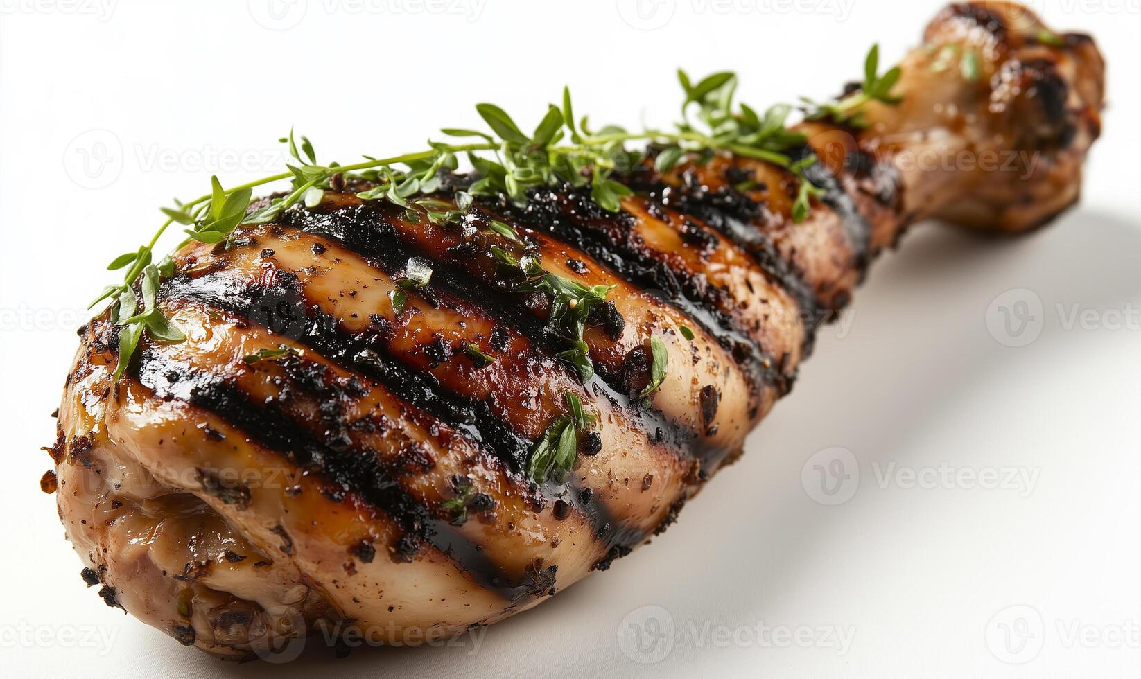 Delicious Grilled Chicken Leg on White Plate photo