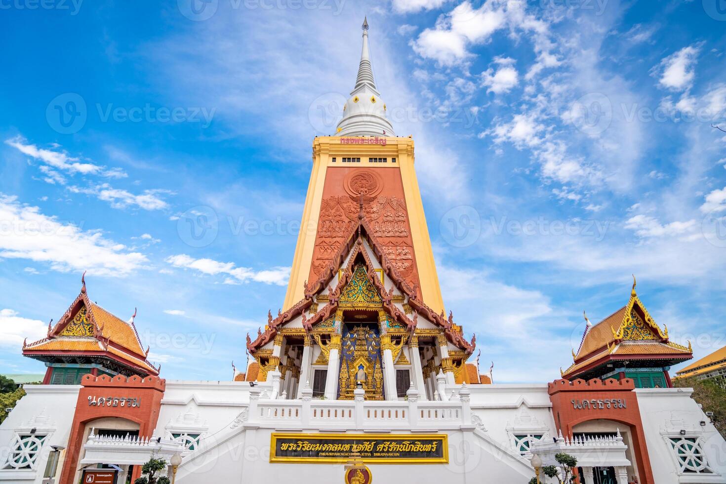 Wat Dhammamongkol is a Buddhist temple in Phra Khanong, Bangkok, Thailand. Thai Language Text letter in Photo mean 1. LONG LIVE THE KING, 2. DHUMMA LAND 3. PAGODA NAME , and 4. TEMPLE NAME.