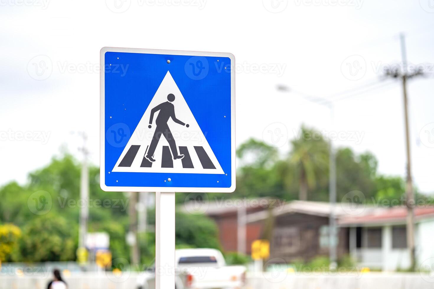 Zebra cross sign beside the road at Thailand. Clipping Path. photo