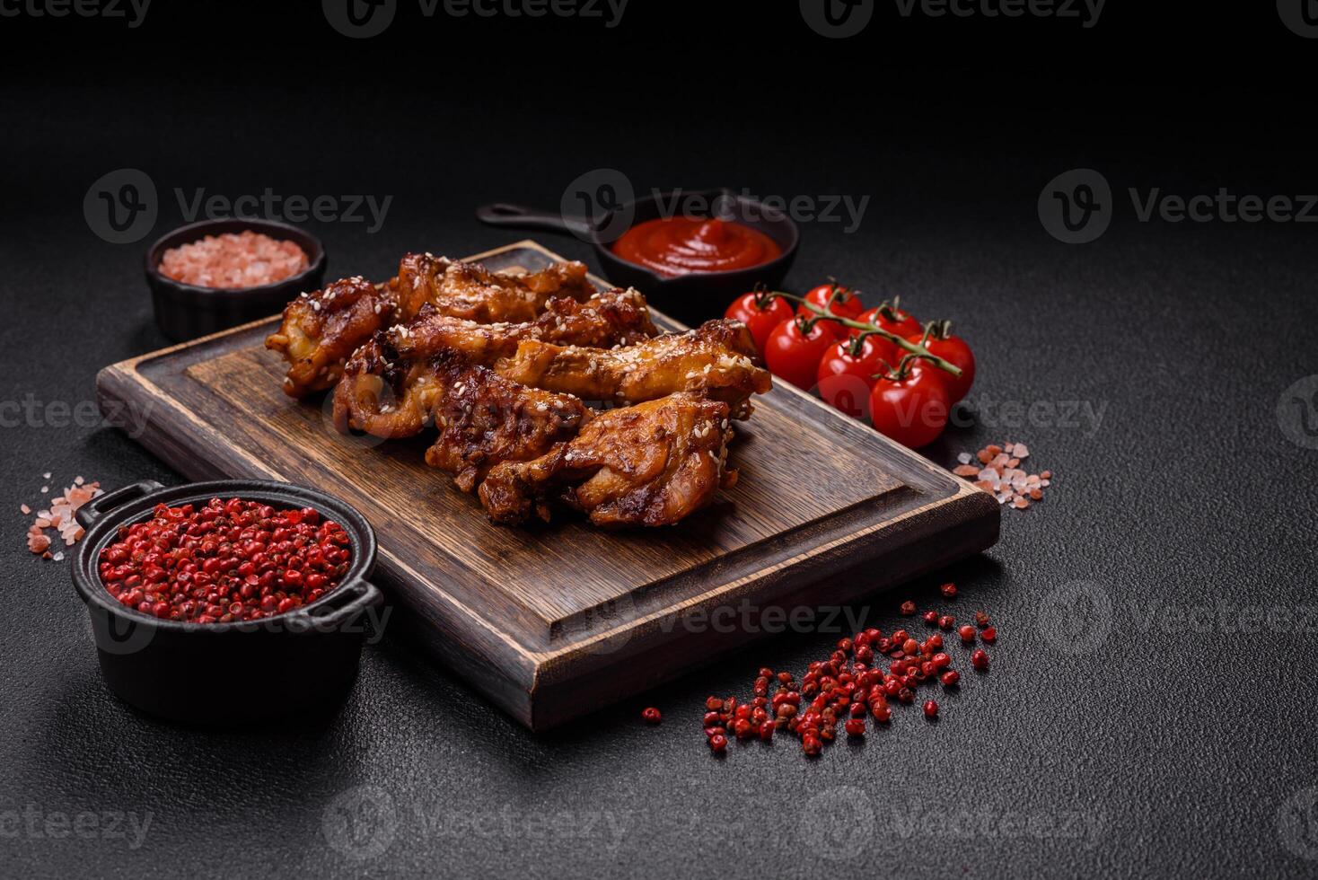 Delicious crispy baked chicken wings in teriyaki sauce photo