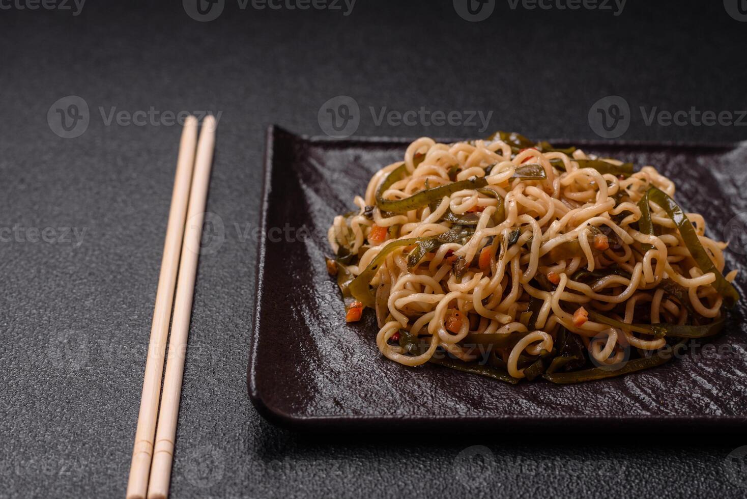 Asian dish rice noodles with salt and spices photo