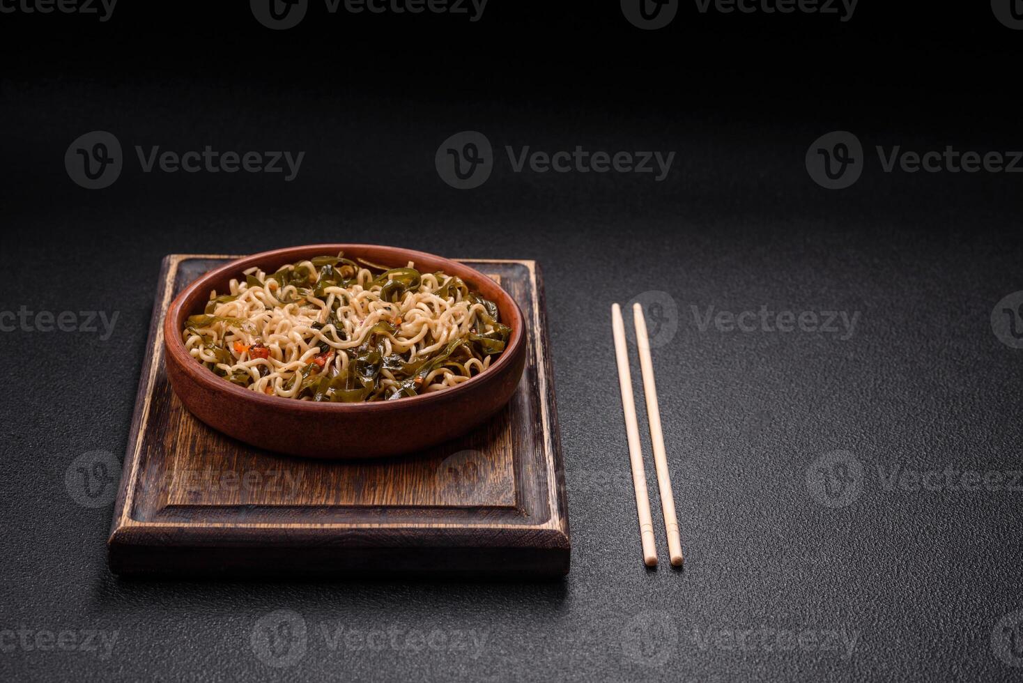 Asian dish rice noodles with salt and spices photo