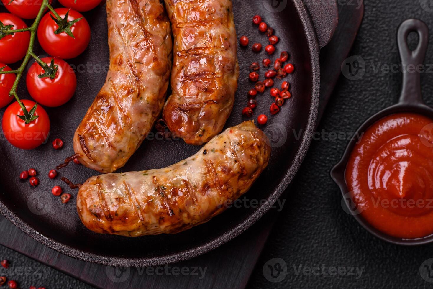 Grilled pork or chicken sausages with salt, spices and herbs photo