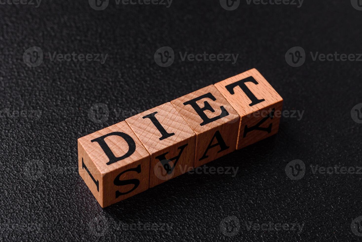 Inscription Diet wooden cubes, conceptual background with copy space photo