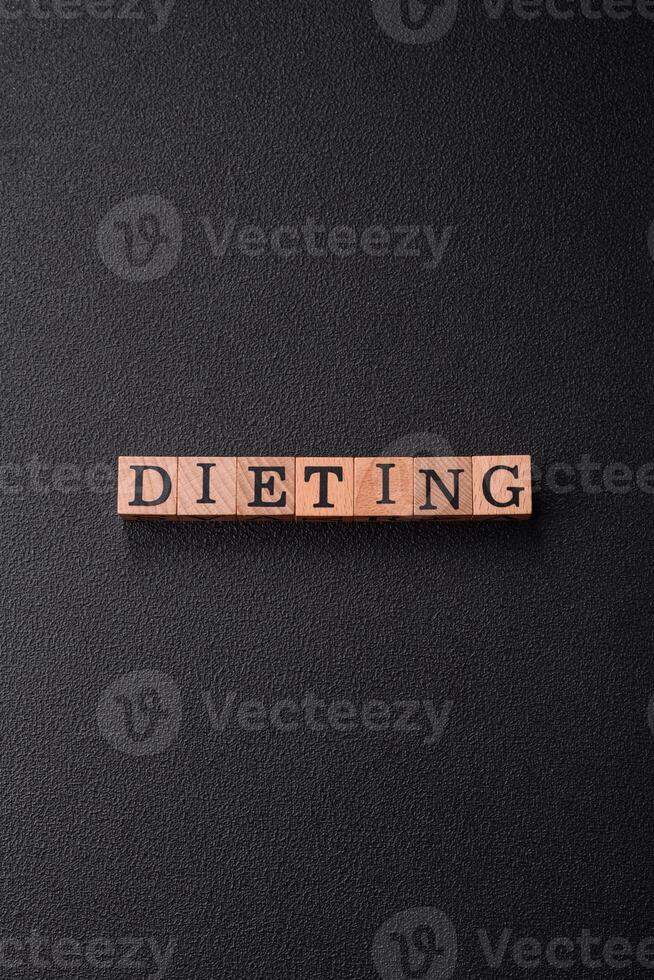 Inscription Diet wooden cubes, conceptual background with copy space photo