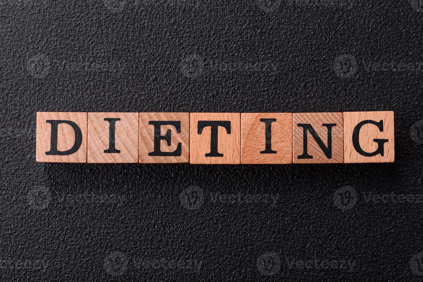 Inscription Diet wooden cubes, conceptual background with copy space photo