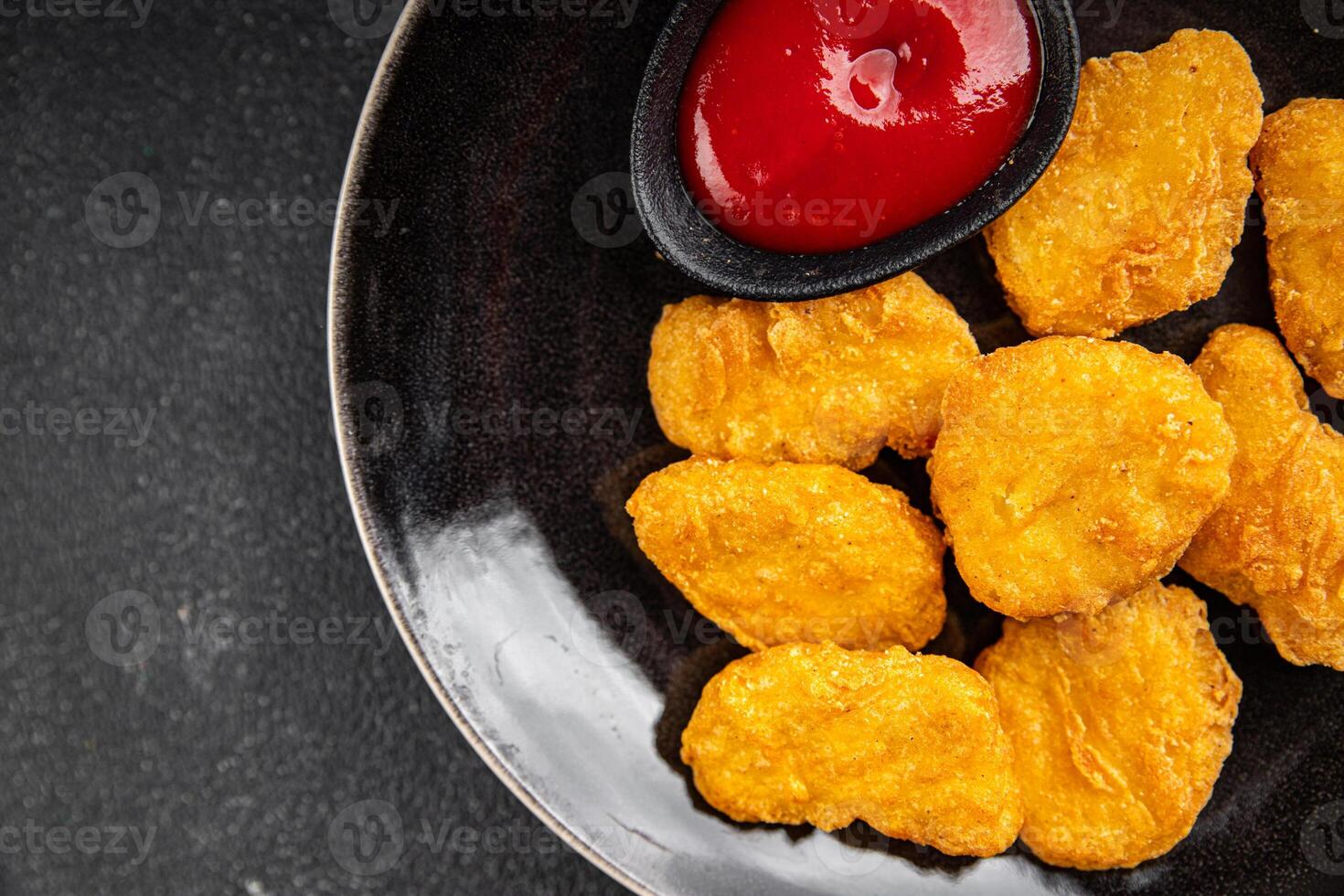 nuggets chicken meat deep fried fresh meal food snack on the table copy space food background rustic top view photo