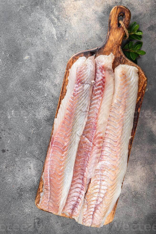 fillet raw white fish cod or halibut fresh meal food snack on the table copy space food background rustic top view photo