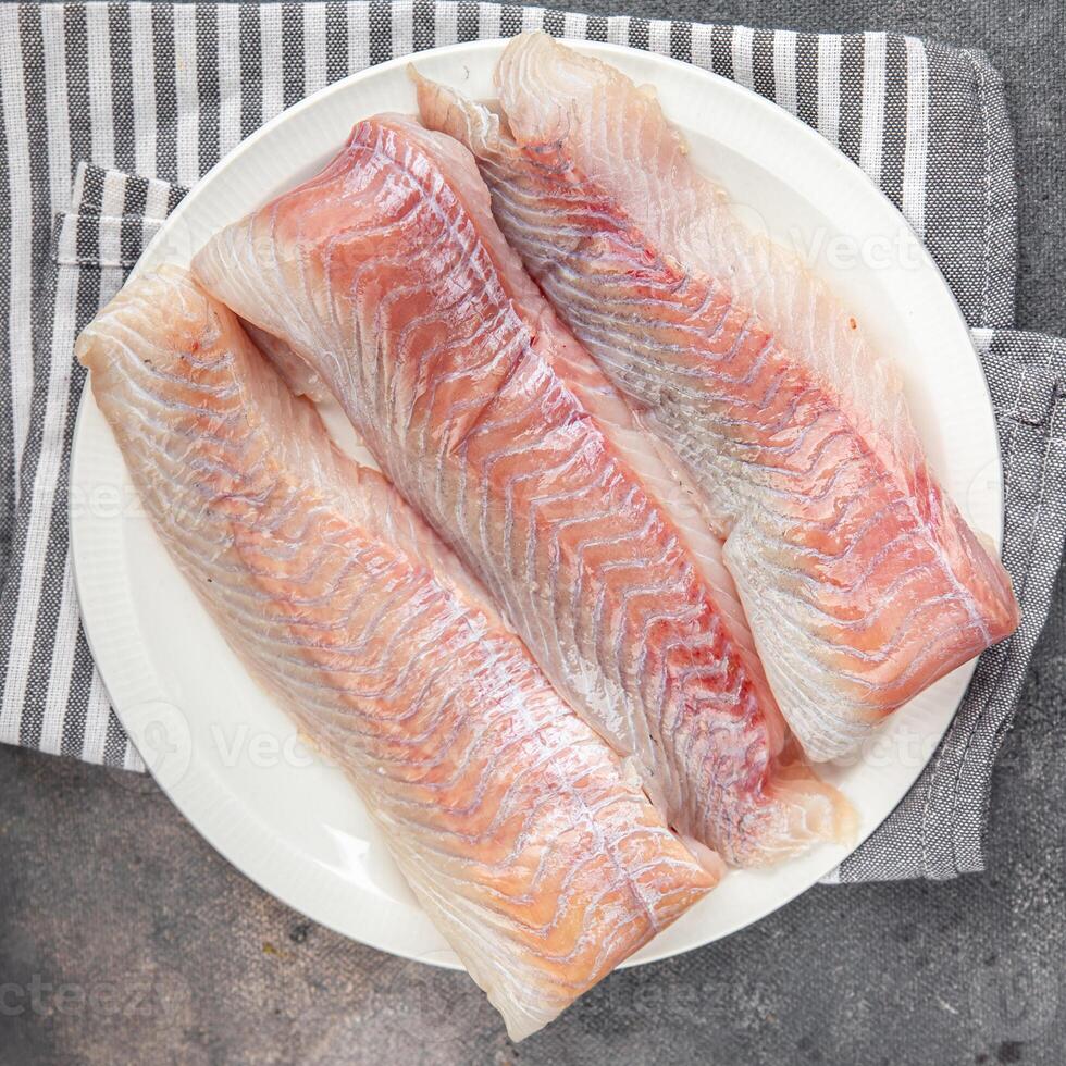 fillet raw white fish cod or halibut fresh meal food snack on the table copy space food background rustic top view photo