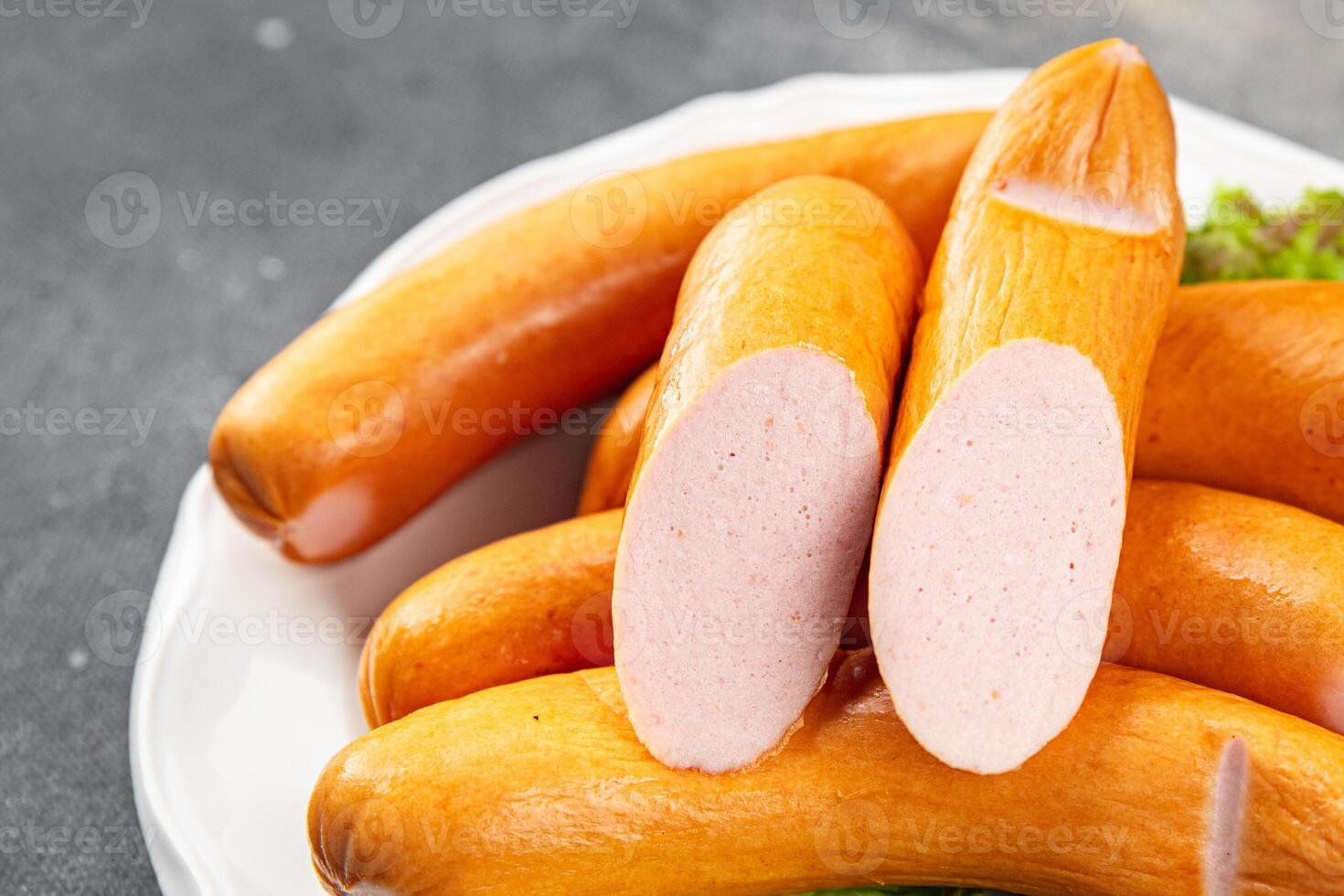 smoked sausages meat pork or chicken, turkey fresh meal food snack on the table copy space food background rustic top view photo