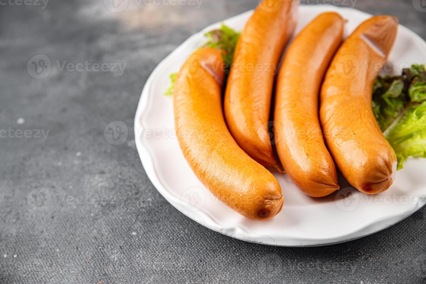 smoked sausages meat pork or chicken, turkey fresh meal food snack on the table copy space food background rustic top view photo