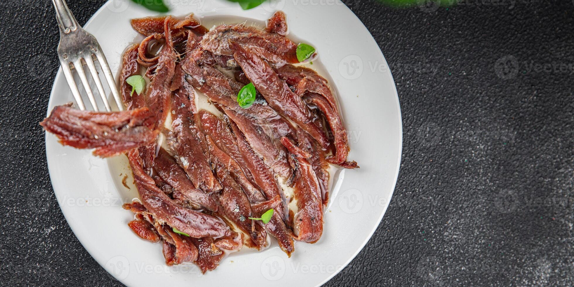 anchovies canned fish in oil fresh and tasty seafood meal food snack on the table copy space food photo