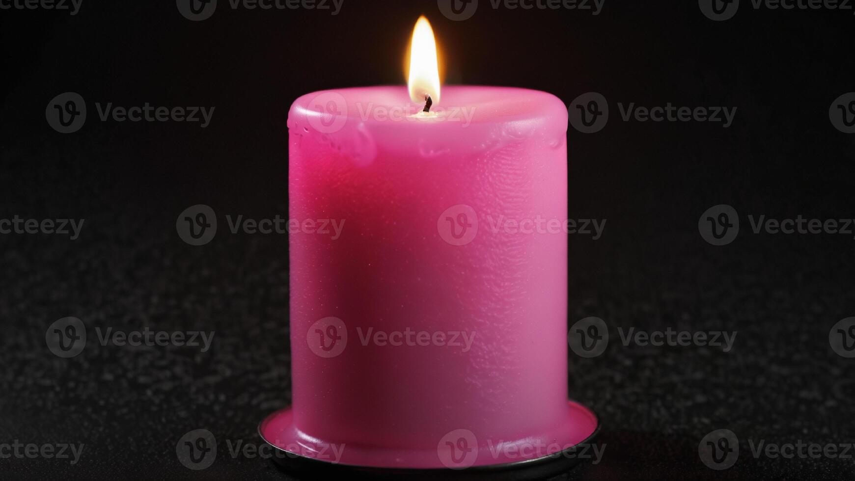 candle on black background photo