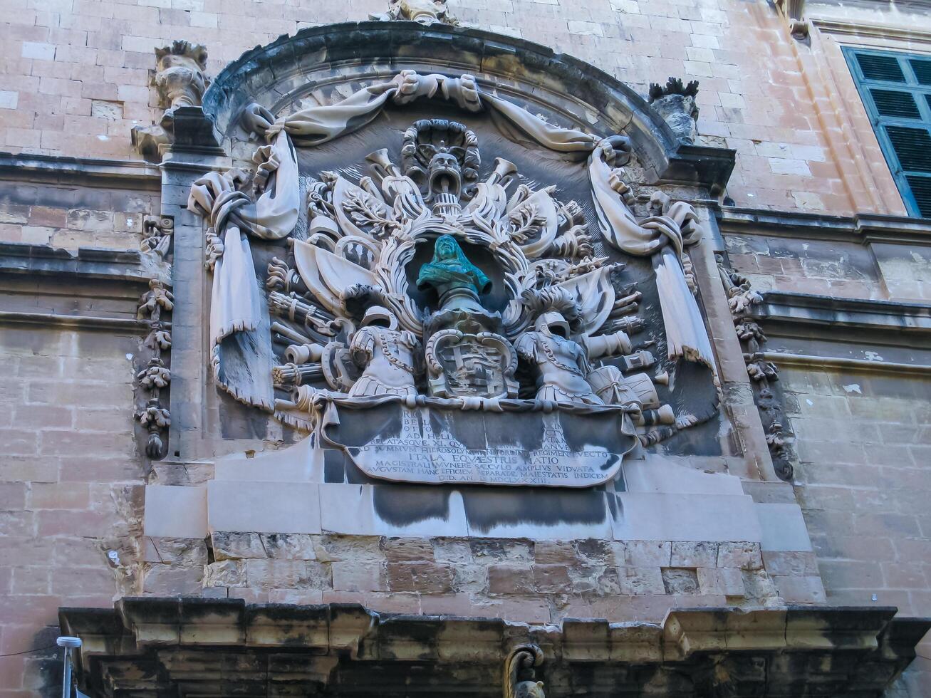 VALLETTA, MALTA - SEPTEMBER 15, 2012 Auberge of Italy bust of Grand Master Carafa della Spina photo