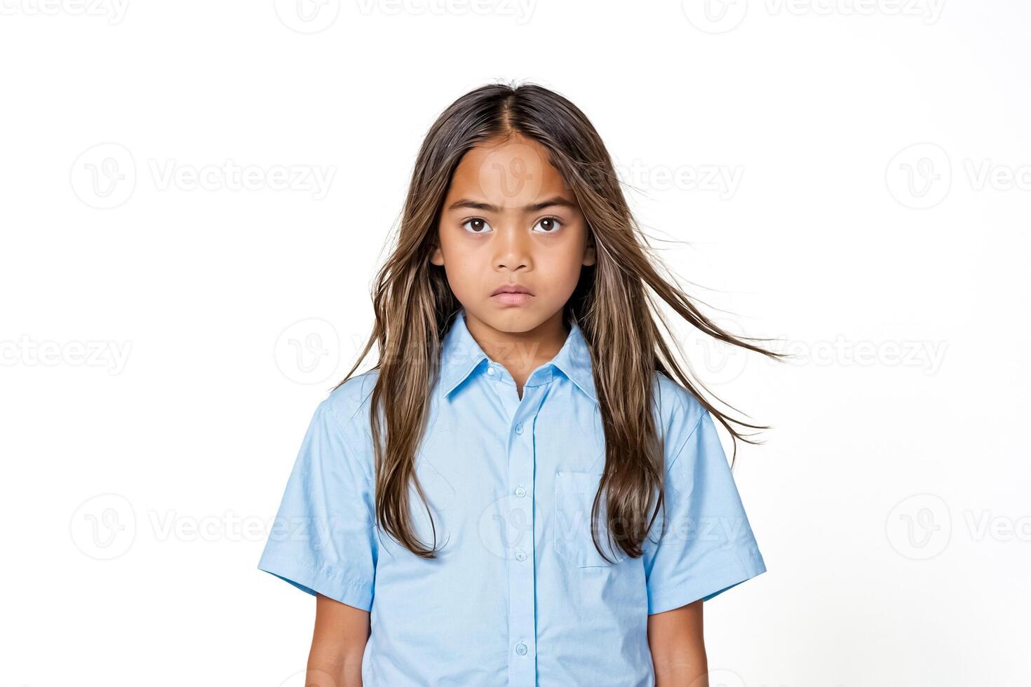 Young girl with serious expression photo