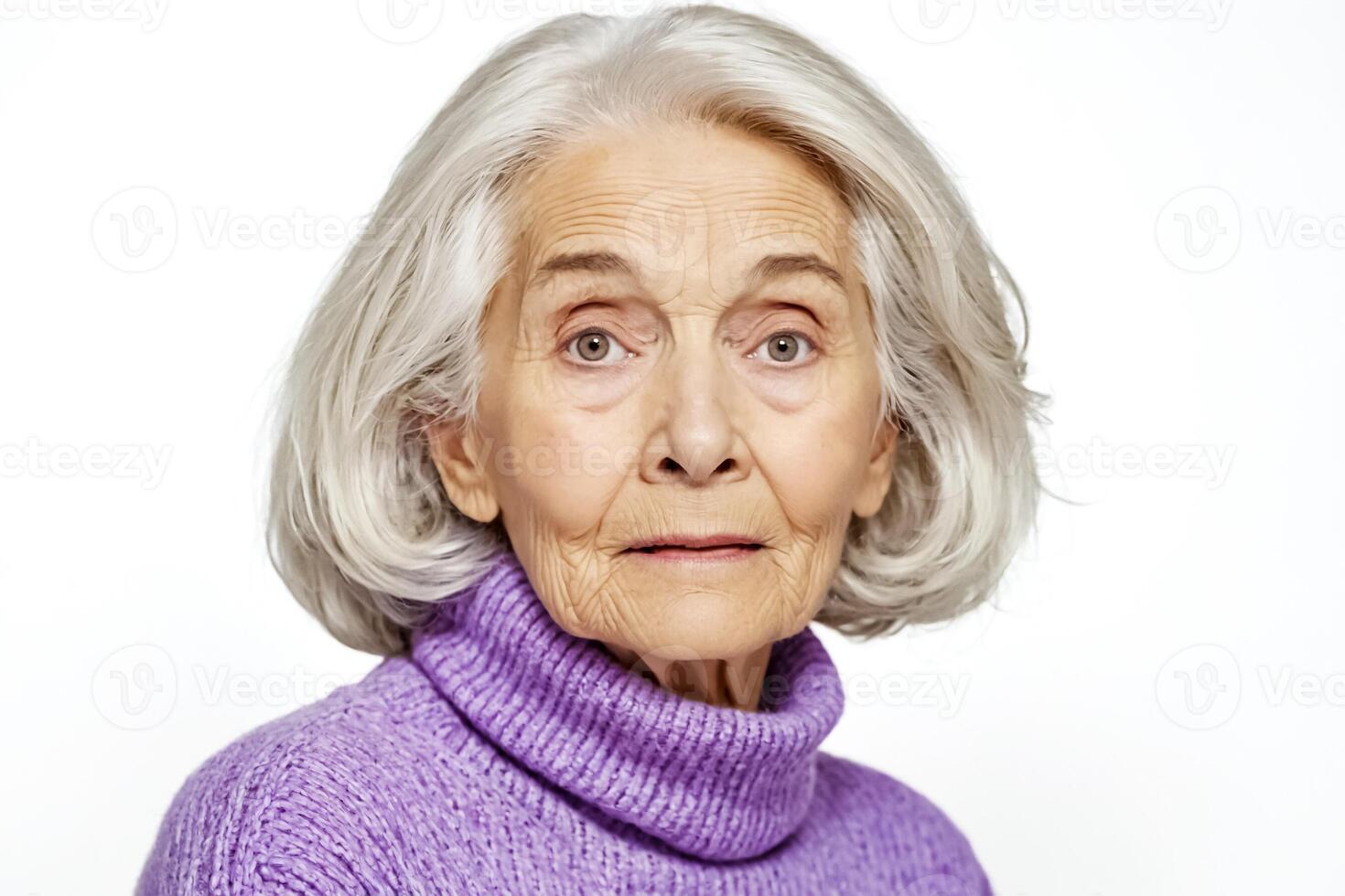 Close-up Portrait of a Senior Woman with Grey Hair and Purple Sweater photo