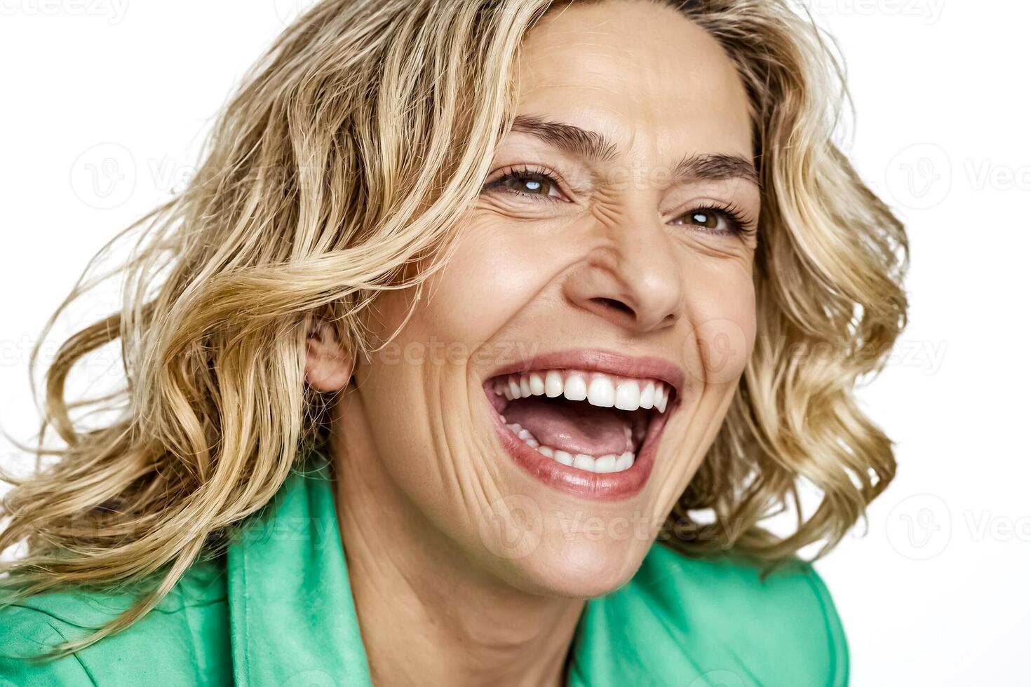 Portrait of a Blonde Woman Laughing photo