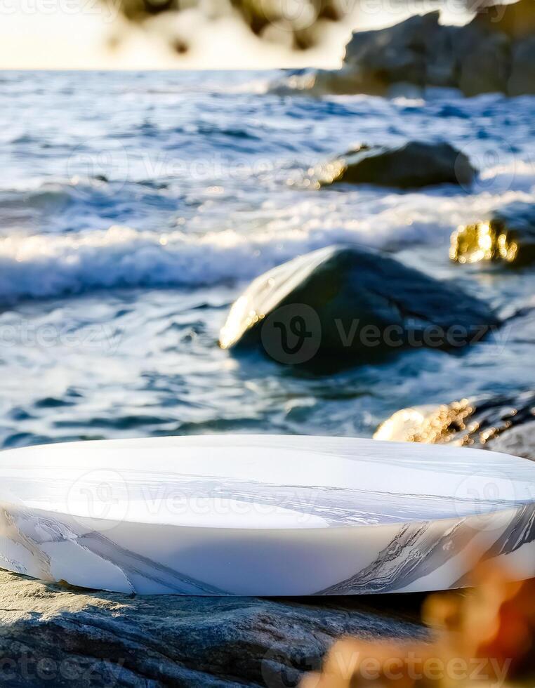 Marble Platform on Rocky Seashore with Blurred Ocean Background photo