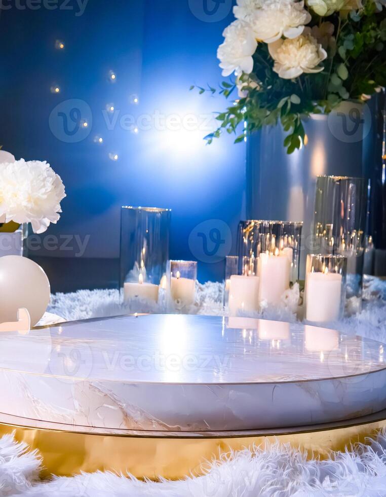 Elegant White Marble Pedestal with Candles and Flowers photo