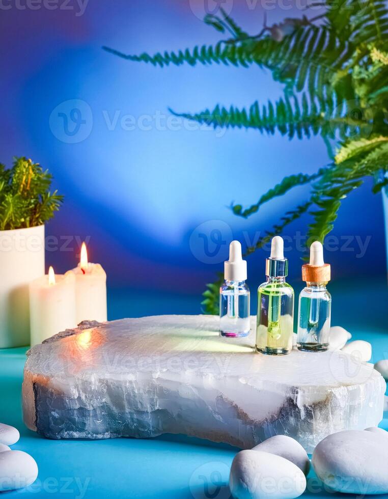 Essential Oils and Candles on Crystal Rock photo
