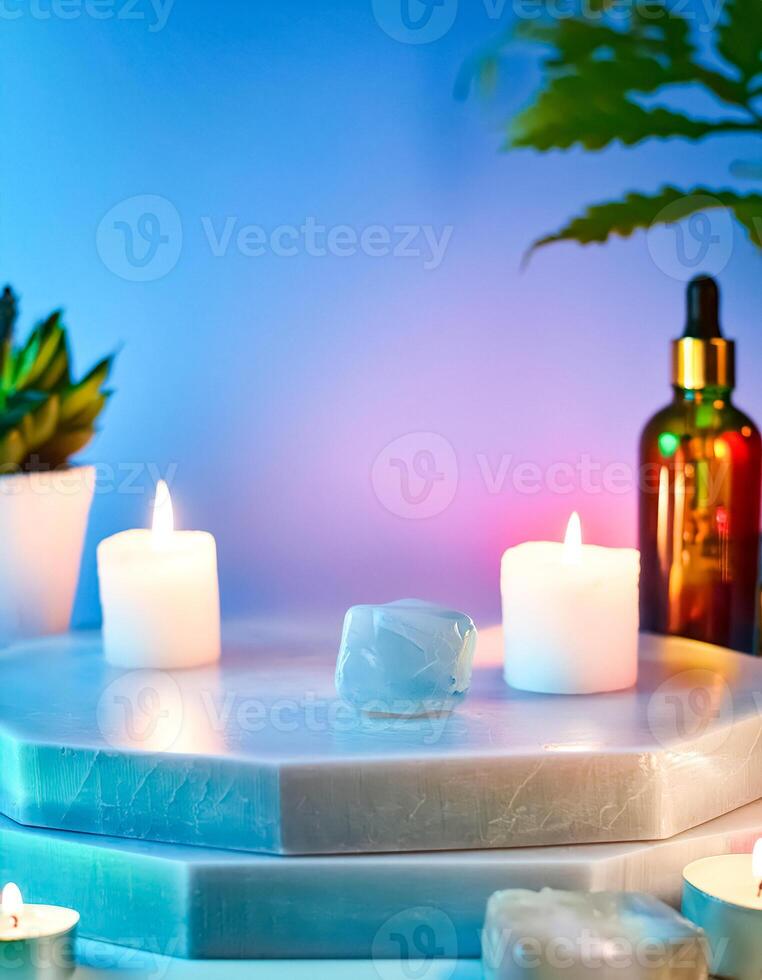 Crystal, Candles, and Essential Oils on a White Marble Platform photo