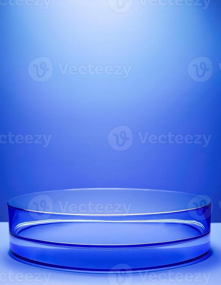 Blue Glass Cylinder On Blue Background photo