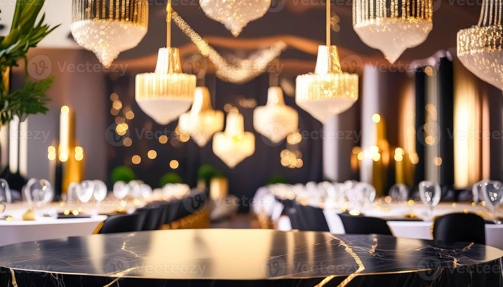Elegant Black Table with Golden Inlays Under Chandeliers photo