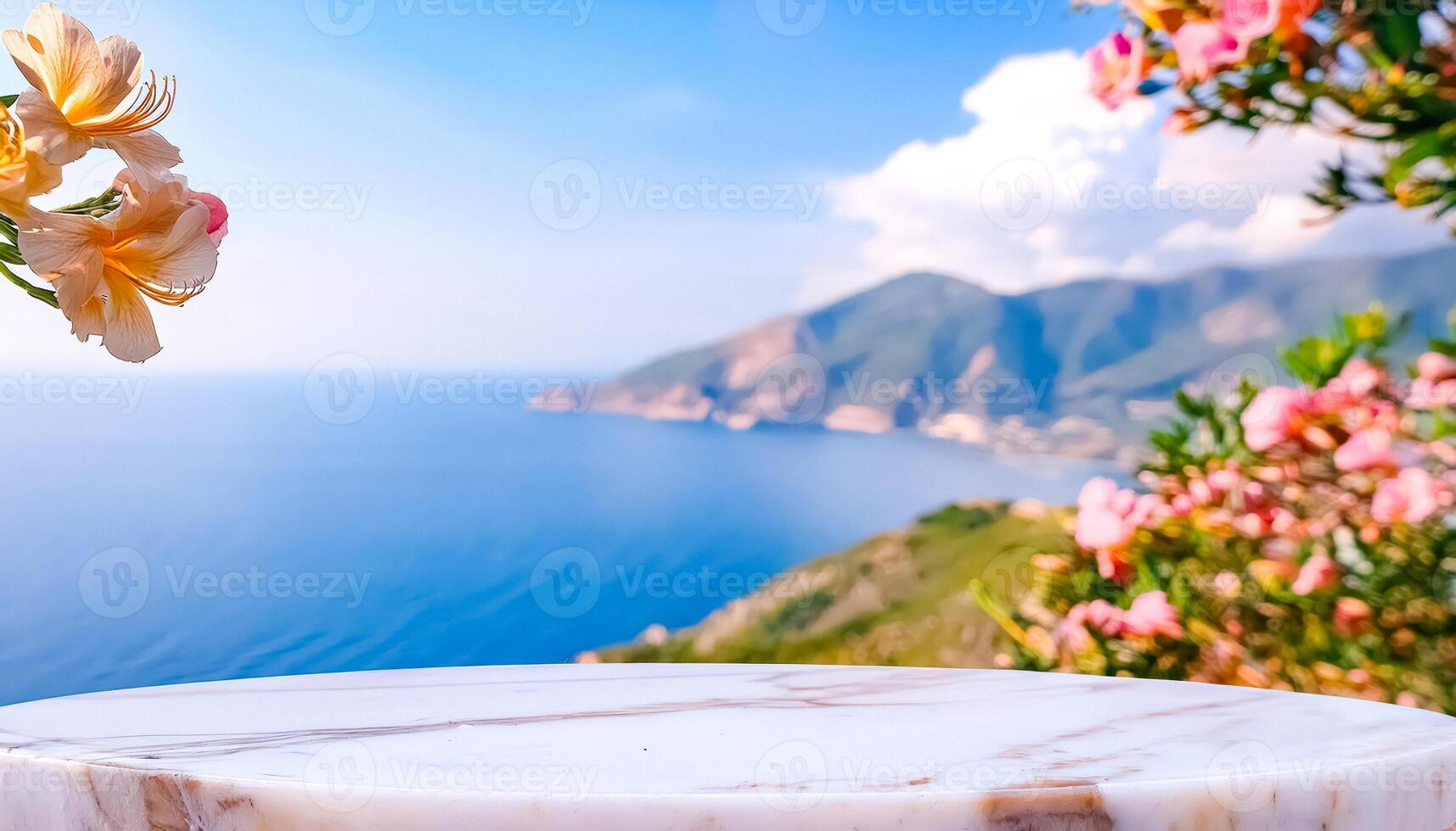 Marble Table with Blurred Background of Ocean, Mountains, and Flowers photo