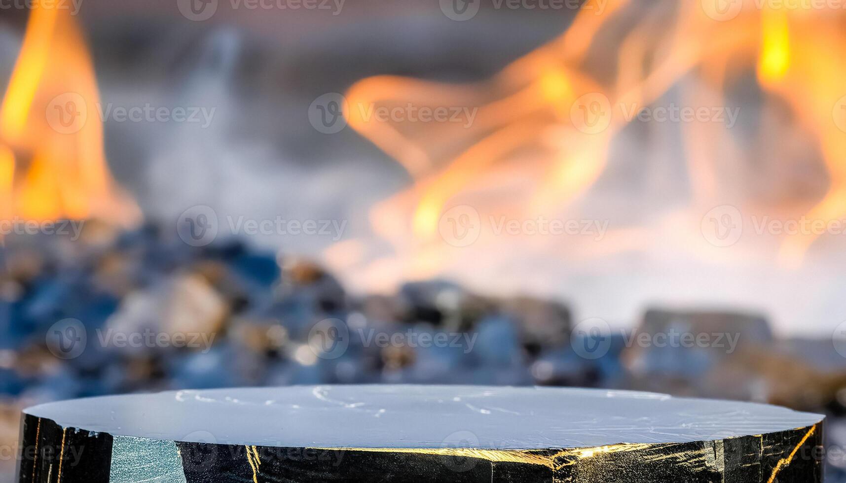 Black and Gold Product Display with Blurred Fire Background photo