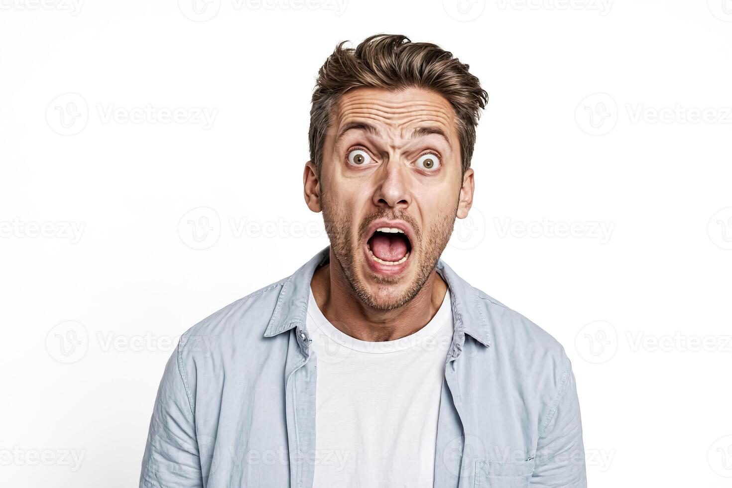 Shocked Man in Blue Shirt photo