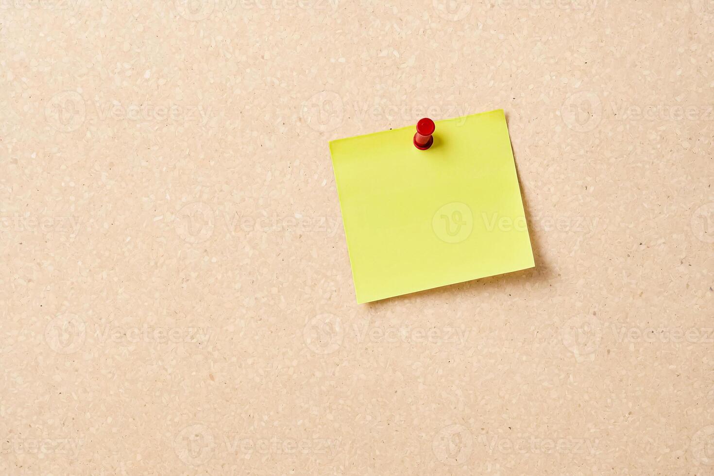 Blank Yellow Sticky Note on Corkboard photo